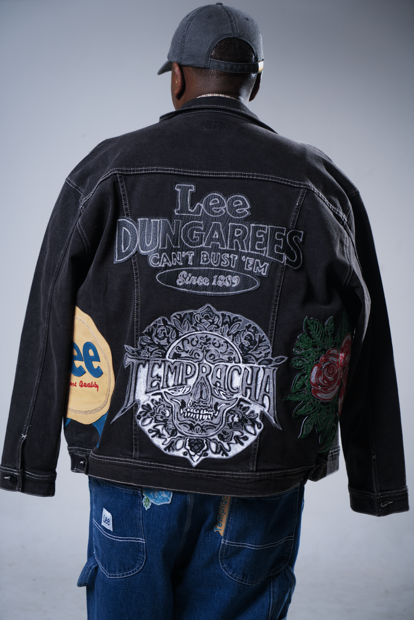 TEMPRACHA embroidered denim jacket photographed from the back
