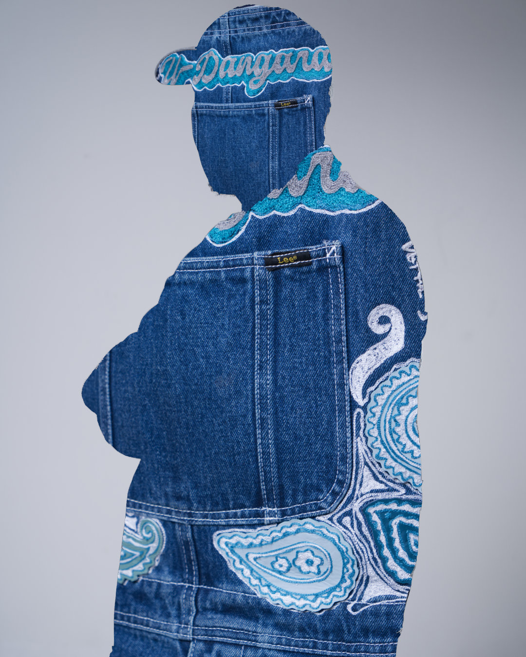 Lee Custom Series denim cutout artwork detail
